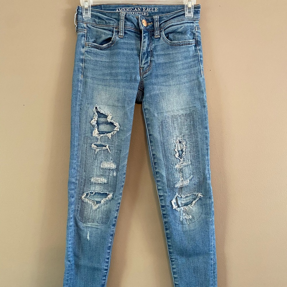 AE patched rips jegging